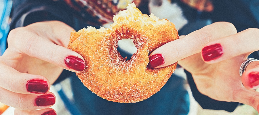 Girl holding a donut
